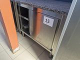 a stainless steel counter top with a number on it