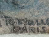 a painting on the side of a building with writing on it