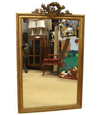 un miroir sur lequel est représenté un chien