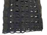 an image of a piece of metal with holes cut out of it