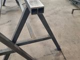 a metal beam that is sitting on the ground