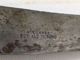 a close up of a knife on a table