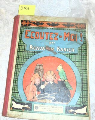an old book with a picture of a boy and a bird on it