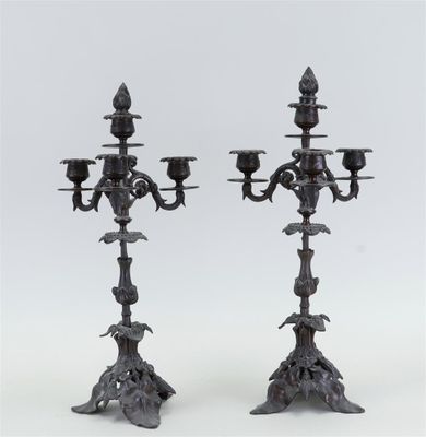 pair of antique bronze candelabs with birds and flowers