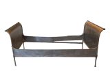an image of a metal bed frame with a sleigh on it