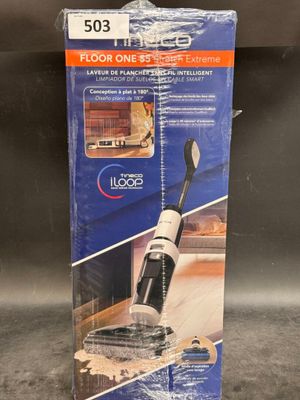 a close up of a box of a vacuum cleaner on a table