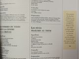 a book open to a list of items on a table