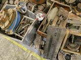 a pile of old machinery sitting on the floor