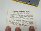 a person holding a piece of paper with a picture on it