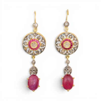 une paire de boucles d'oreilles en rubis et diamants