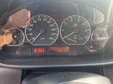 a close up of a car dashboard with various gauges