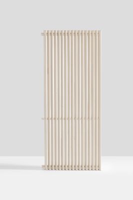 a white radiator sitting on top of a table next to a wall