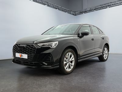 a grey 2020 audi qx parked in a garage