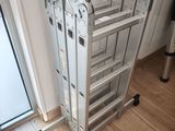 a ladder that is sitting on the floor next to a window