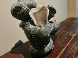 a vase that is sitting on a table in a room
