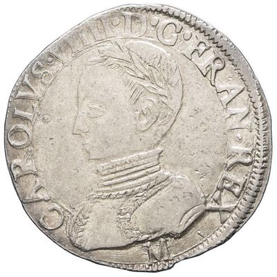 a close up of a coin on a white background