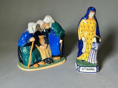 deux figurines d'un homme et d'une femme assis sur un banc