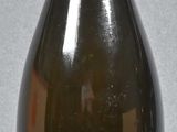 a bottle of wine that is sitting on a table