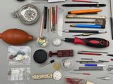 a table with a lot of tools and tools on it