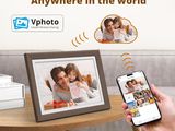 a person holding a smart phone and taking a picture of a picture of a family