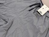 a close up of a pair of pants with a tag on it
