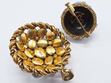 two gold and enamel brooches and a ring