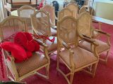 many chairs in a room with a red bag on the floor