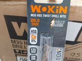 a package of wood drill bits in a cardboard box