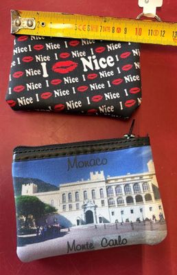 two purses that are sitting next to each other