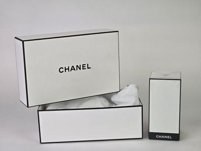 a white box with a black and white logo next to a white box with a black and white logo