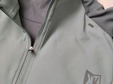a close up of a jacket with a hoodie on it
