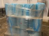 a pallet full of plastic wrapped items on a pallet