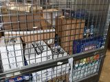 a metal cart with a lot of items inside of it