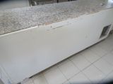 an image of a kitchen with a marble counter top