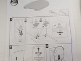 diagram of a toilet with instructions on it sitting on a table