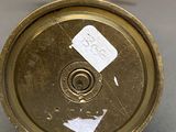 an image of a close up of a metal object on a table