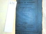 un livre ouvert sur une table, avec une étiquette