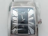 a close up of a wrist watch with a black face