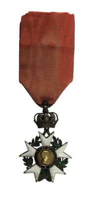 l'image d'une médaille surmontée d'une étoile