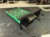 an image of a close up of a circuit board on a table