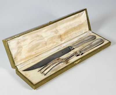 Deux couverts à gigot, le manche en argent fourré 950 milliè…