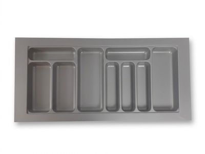 une image représentant un plateau en plastique à compartiments sur fond blanc