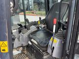 an image of a forklift driver ' s seat in the back of a truck
