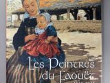la couverture d'un livre sur laquelle figure le portrait d'une femme tenant un bébé dans ses bras