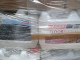 a stack of plastic containers that are wrapped up on a pallet