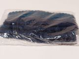 a plastic bag with a bunch of blue stuff inside of it