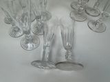 a lot of empty wine glasses on the table