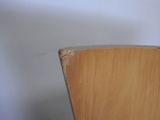 a close up of a wooden chair with a white background