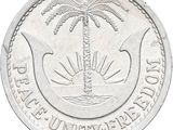 une image représentant une pièce d'argent sur laquelle figure un palmier