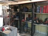 a room filled with lots of different types of luggage